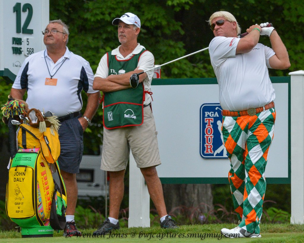 John Daly in orange, green and white argyle trousers at the 2013 Greenbrier Classic